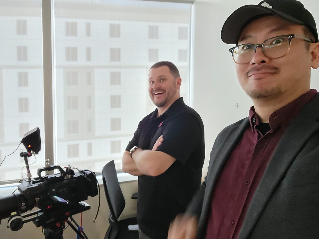 On set with crew, hallway